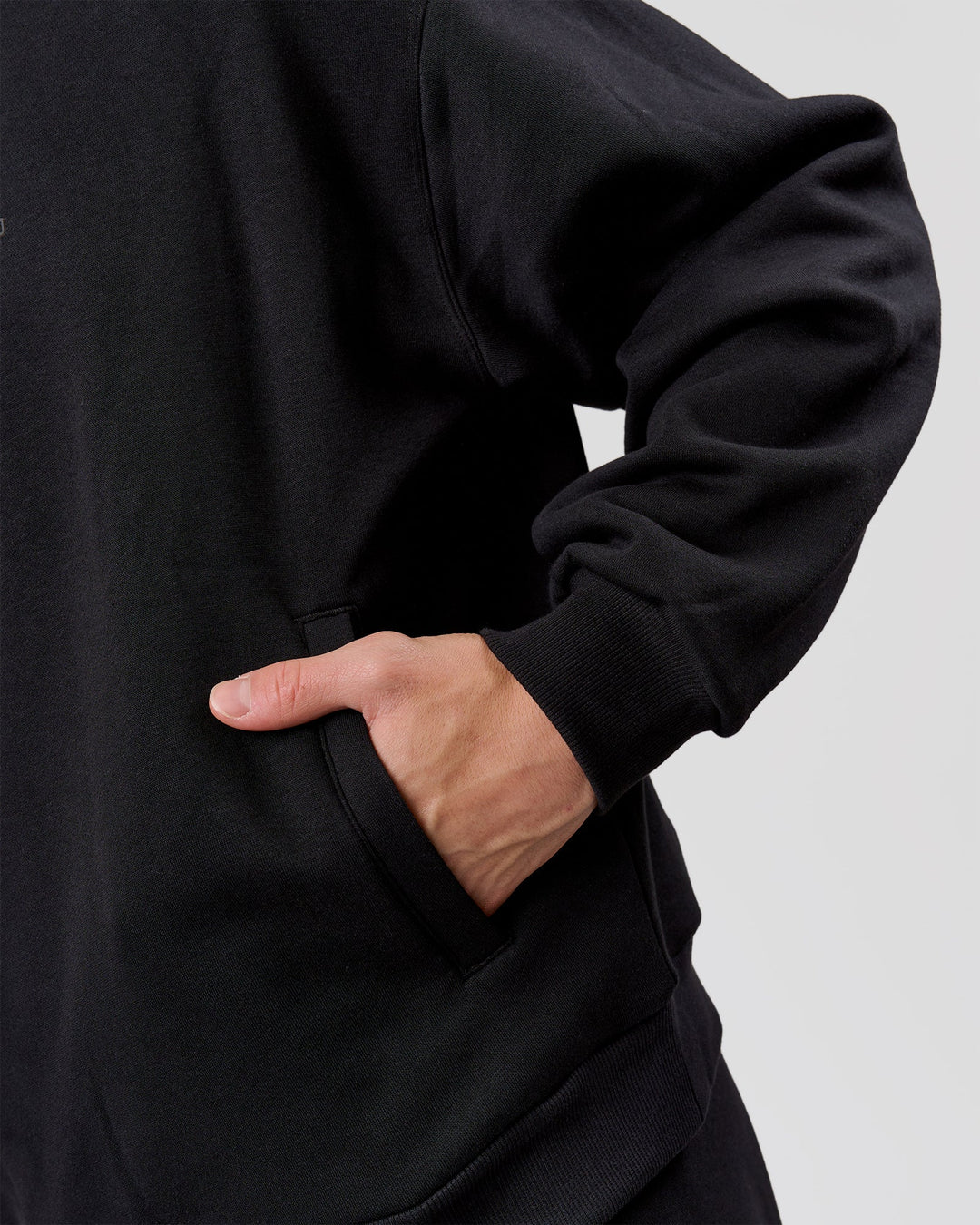 Man wearing Base Quarter Zip Sweater - Black | Model:Leandro | Size:M - view 11