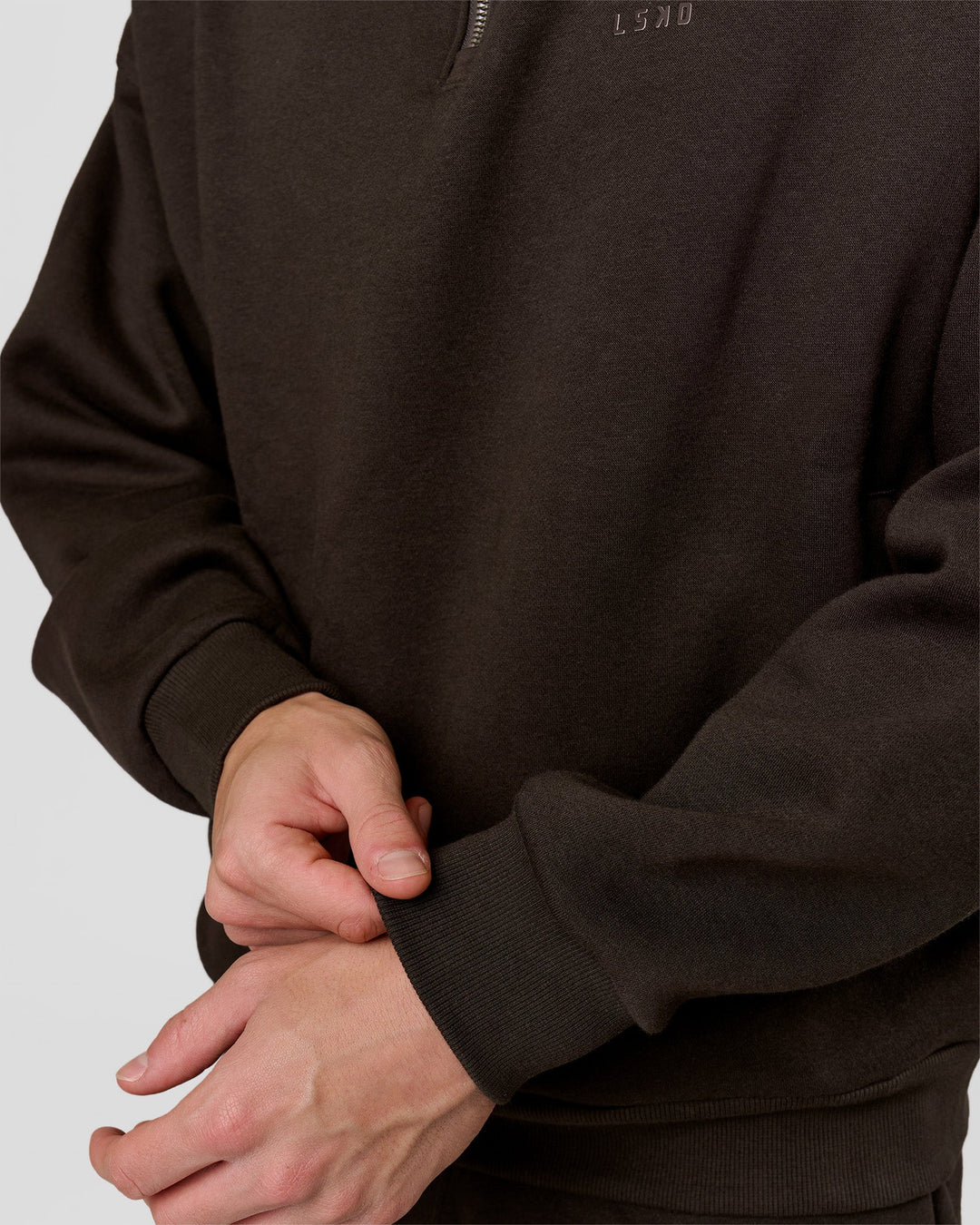 Man wearing Base Quarter Zip Sweater - Ground Coffee | Model:Leandro | Size:M - view 6