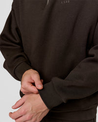 Man wearing Base Quarter Zip Sweater - Ground Coffee | Model:Leandro | Size:M | Thumbnail Index: 5