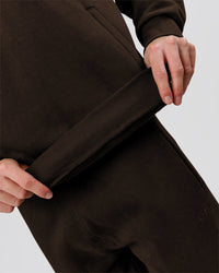 Man wearing Base Quarter Zip Sweater - Ground Coffee | Model:Leandro | Size:M | Thumbnail Index: 8