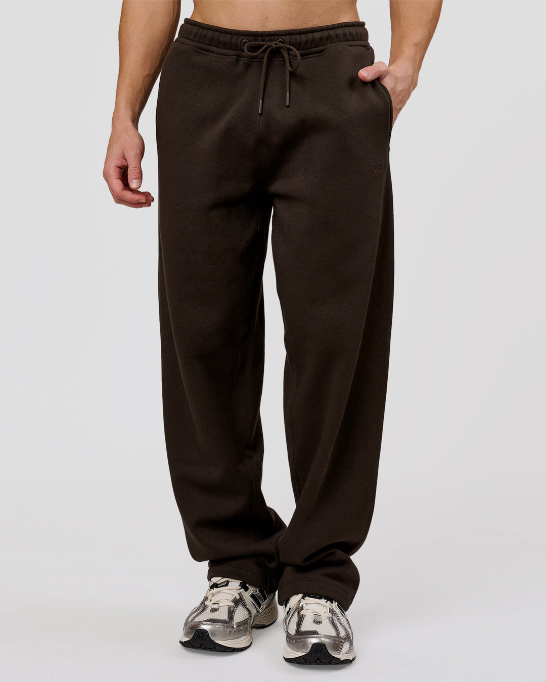 Man wearing Base Wide Leg Track Pant - Ground Coffee | Model:Leandro | Size:M - view 1
