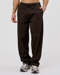 Man wearing Base Wide Leg Track Pant - Ground Coffee | Model:Leandro | Size:M | Thumbnail Index: 0