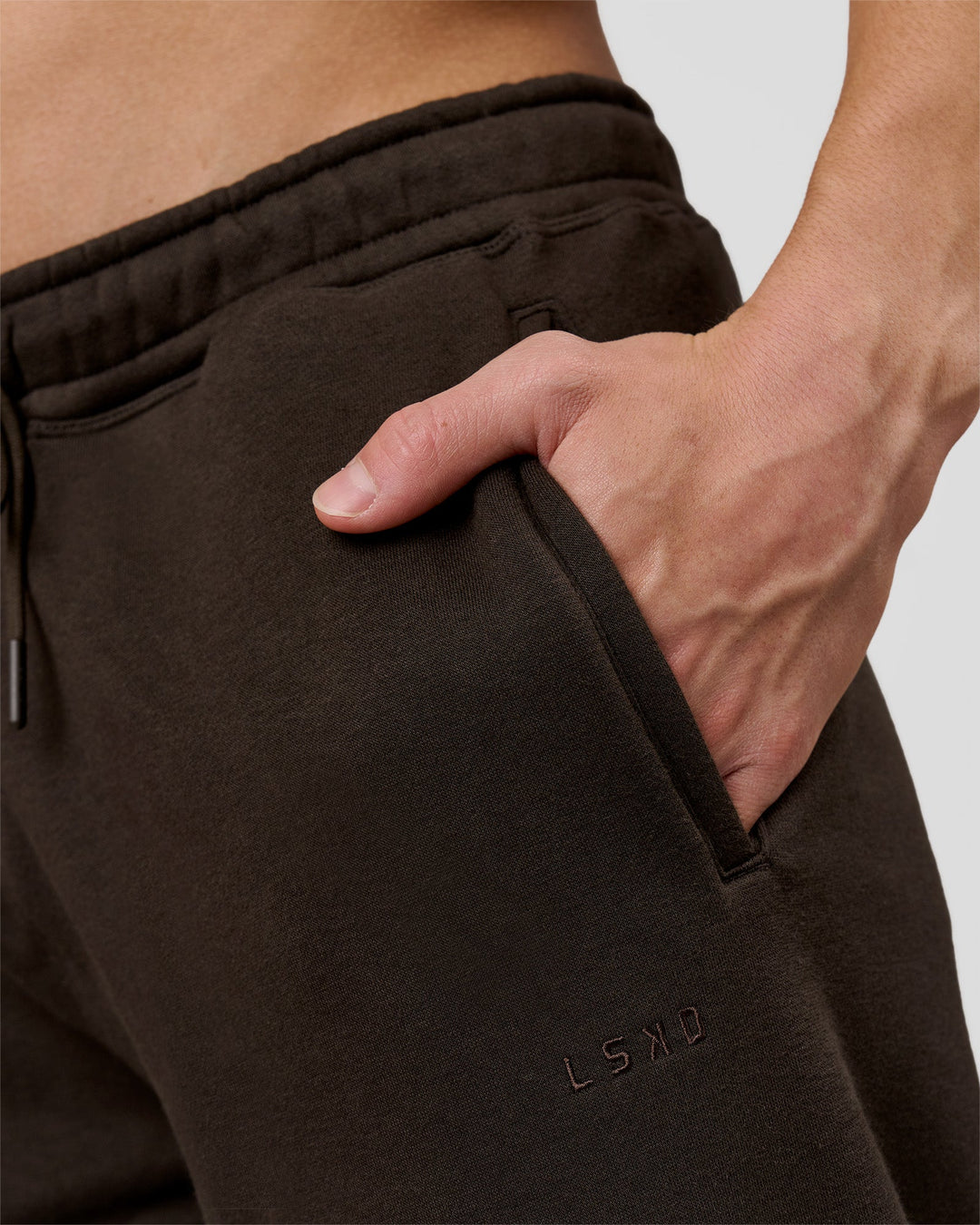 Man wearing Base Wide Leg Track Pant - Ground Coffee | Model:Leandro | Size:M - view 6