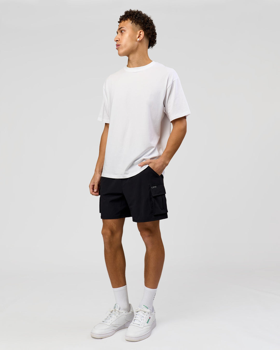 Man wearing Benchmark FLXCotton Oversized Tee - White-Pale Lilac | Model:Leandro | Size:M - view 15