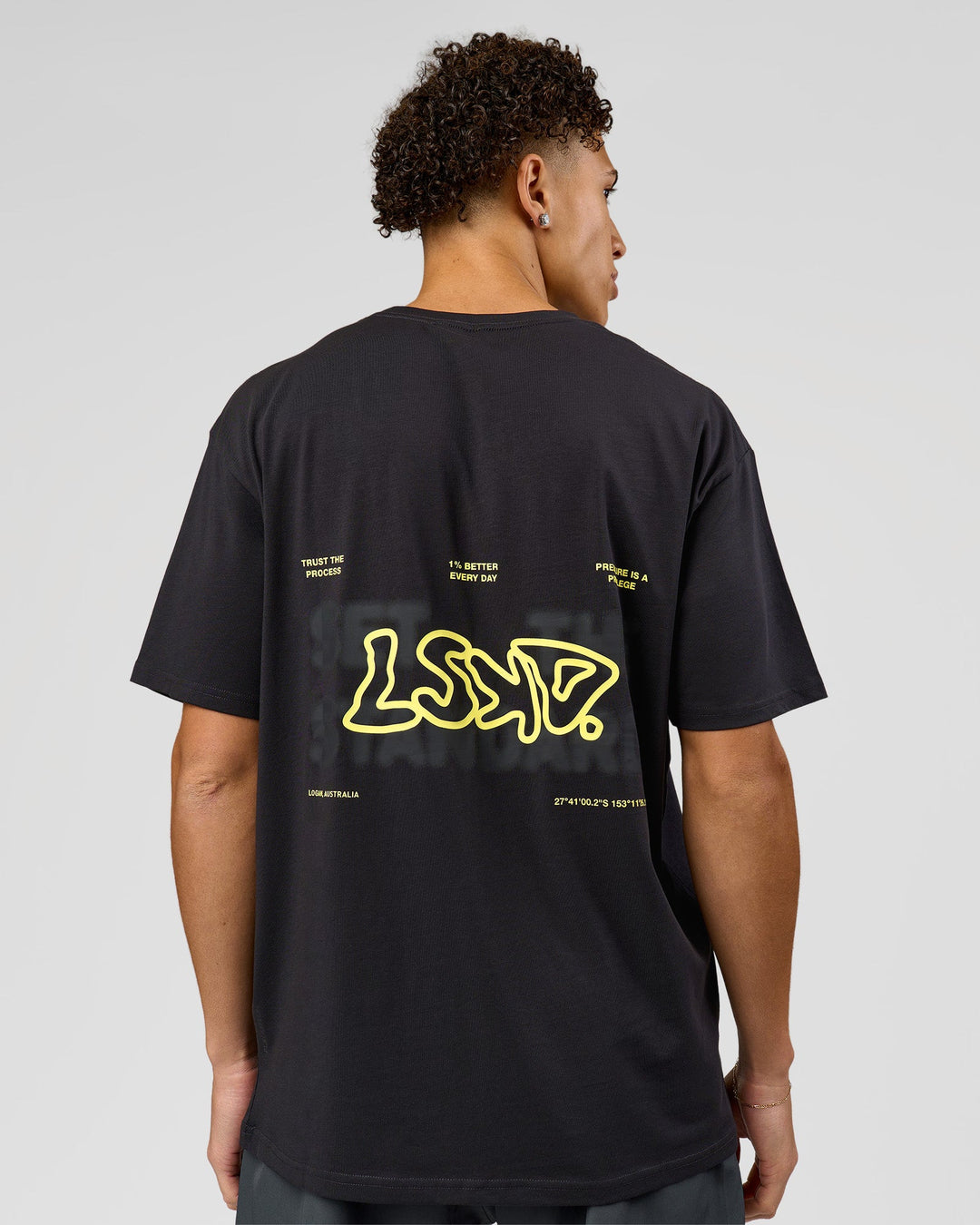 Man wearing Benchmark FLXCotton Oversized Tee - Onyx-Yellow Fizz | Model:Leandro | Size:M - view 7