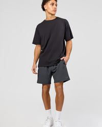 Man wearing Benchmark FLXCotton Oversized Tee - Onyx-Yellow Fizz | Model:Leandro | Size:M | Thumbnail Index: 10