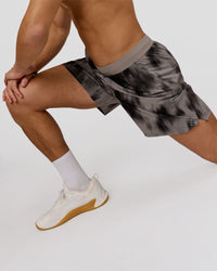 Man wearing Functional Training 7" Short - Bitmap Blur Storm Front | Model:Leandro | Size:M | Thumbnail Index: 1