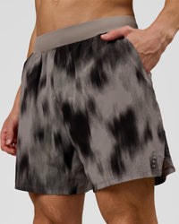 Man wearing Functional Training 7" Short - Bitmap Blur Storm Front | Model:Leandro | Size:M | Thumbnail Index: 0