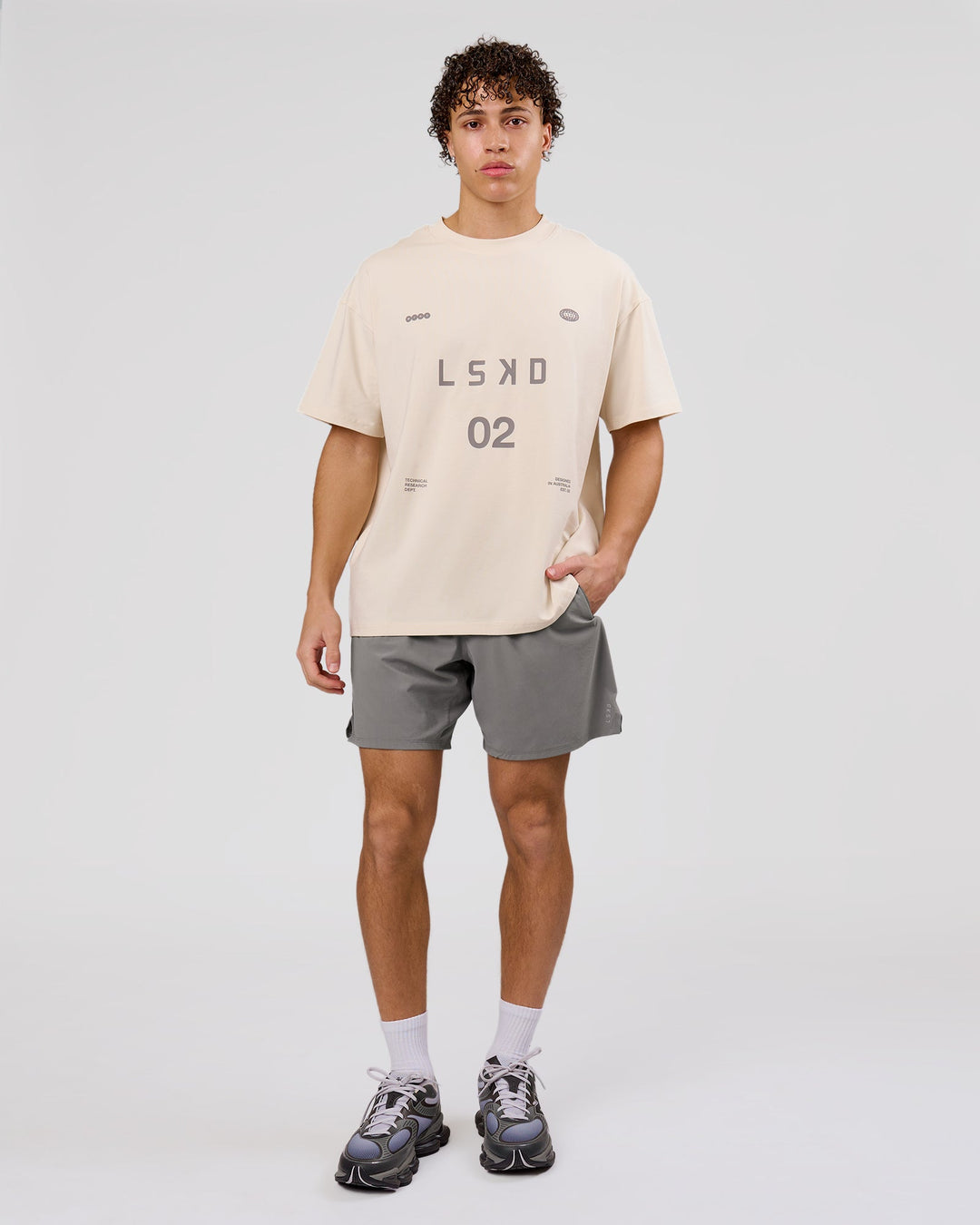 Man wearing Game Plan Heavyweight FLXCotton Oversized Tee - Vanilla Bean | Model:Leandro | Size:M - view 5