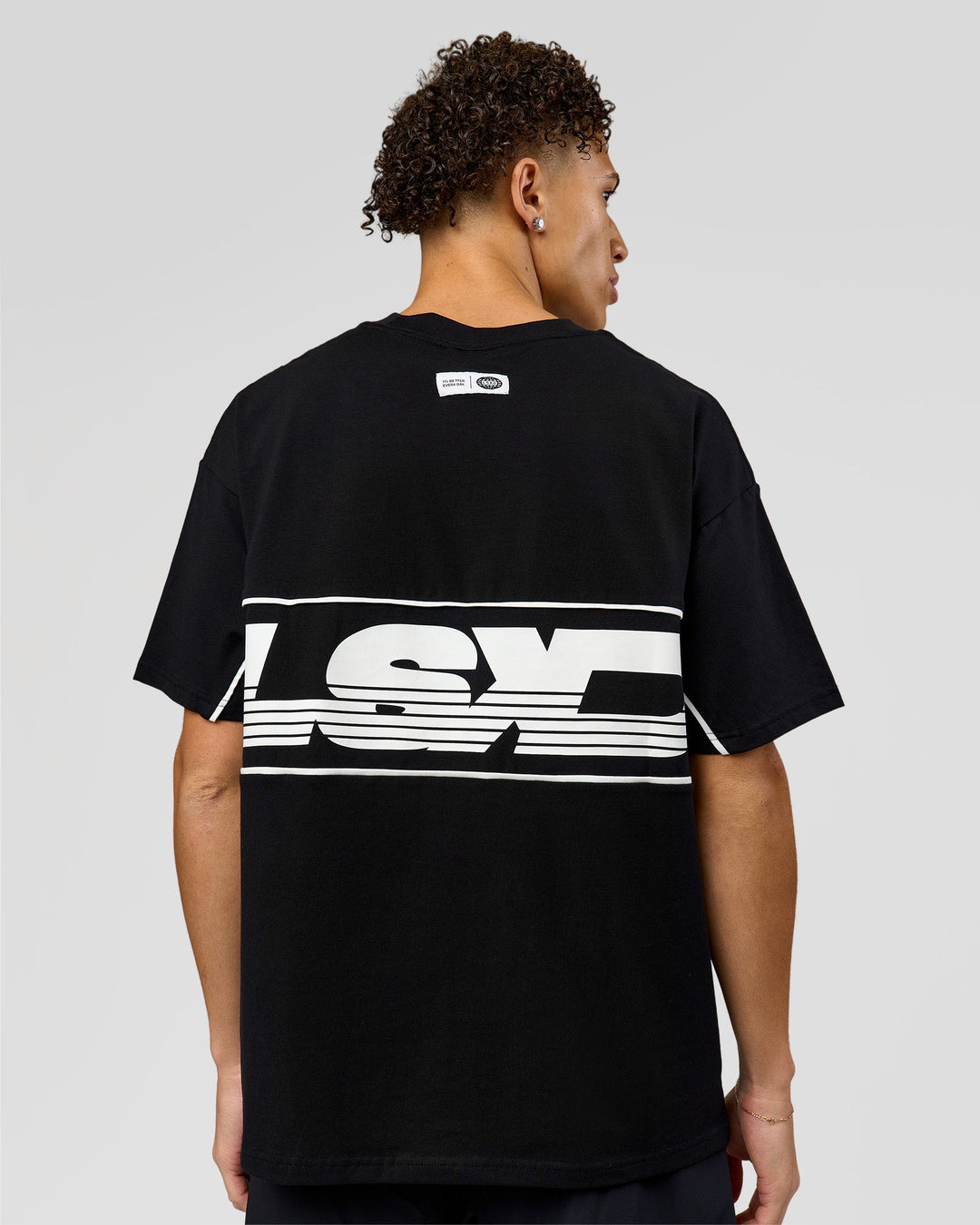 Man wearing Inline Heavyweight FLXCotton Oversized Tee - Black-White | Model:Leandro | Size:M - view 4