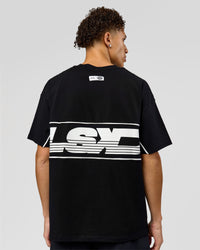 Man wearing Inline Heavyweight FLXCotton Oversized Tee - Black-White | Model:Leandro | Size:M | Thumbnail Index: 3