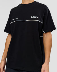 Man wearing Inline Heavyweight FLXCotton Oversized Tee - Black-White | Model:Leandro | Size:M | Thumbnail Index: 7