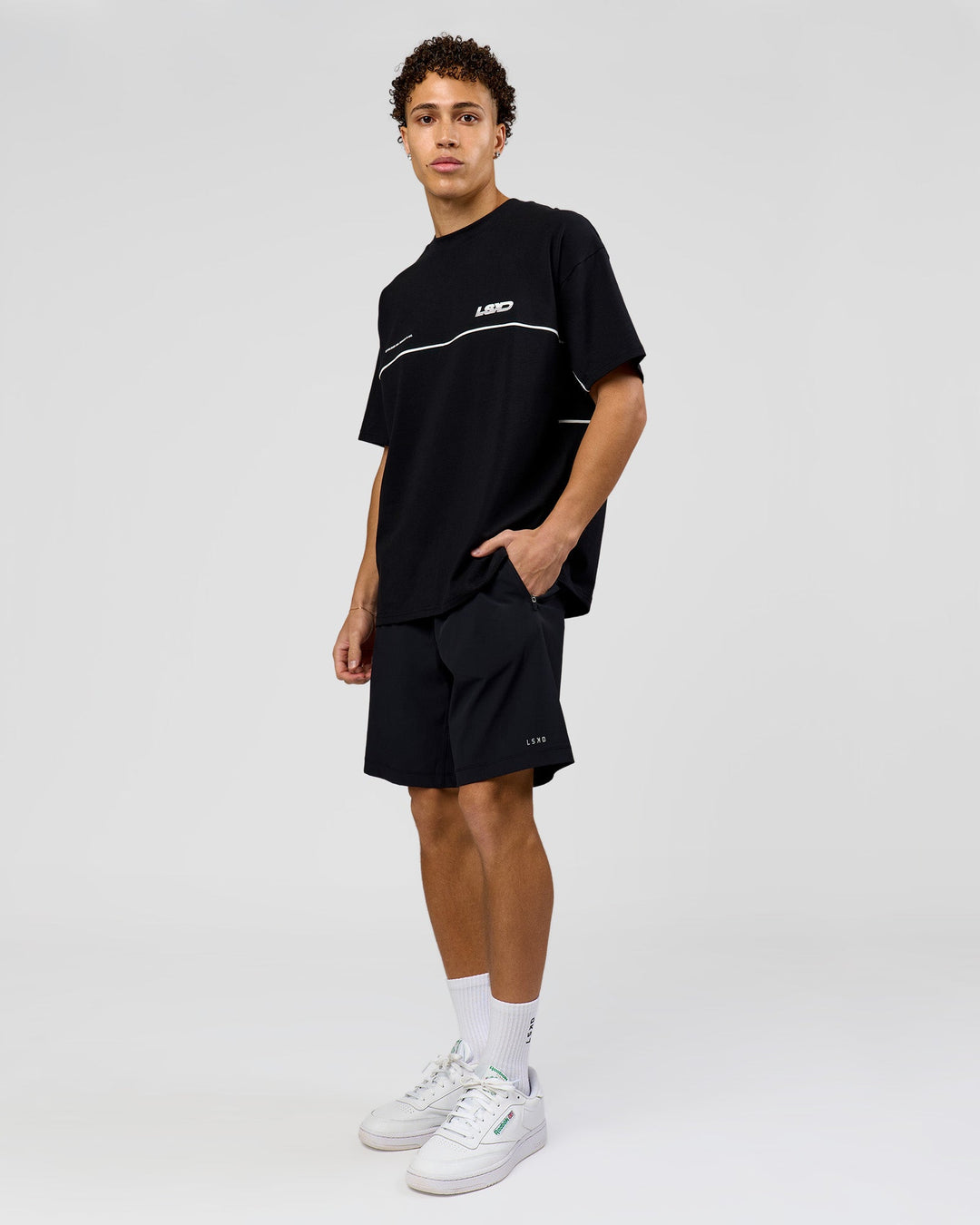 Man wearing Inline Heavyweight FLXCotton Oversized Tee - Black-White | Model:Leandro | Size:M - view 13