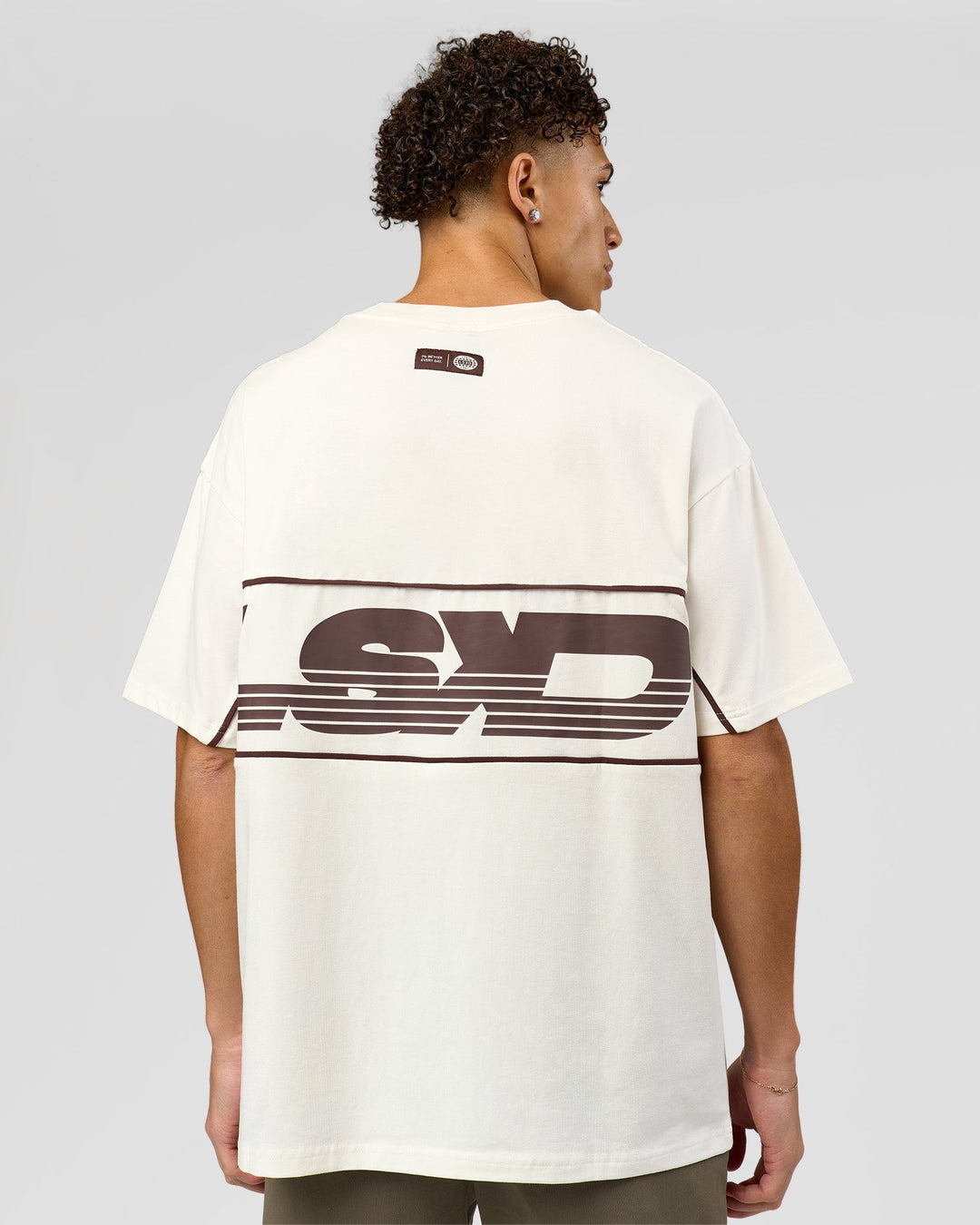 Man wearing Inline Heavyweight FLXCotton Oversized Tee - Off White-Hot Chocolate | Model:Leandro | Size:M - view 4