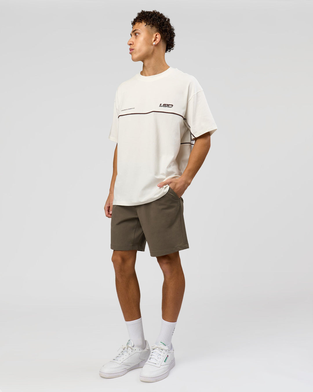 Man wearing Inline Heavyweight FLXCotton Oversized Tee - Off White-Hot Chocolate | Model:Leandro | Size:M - view 7