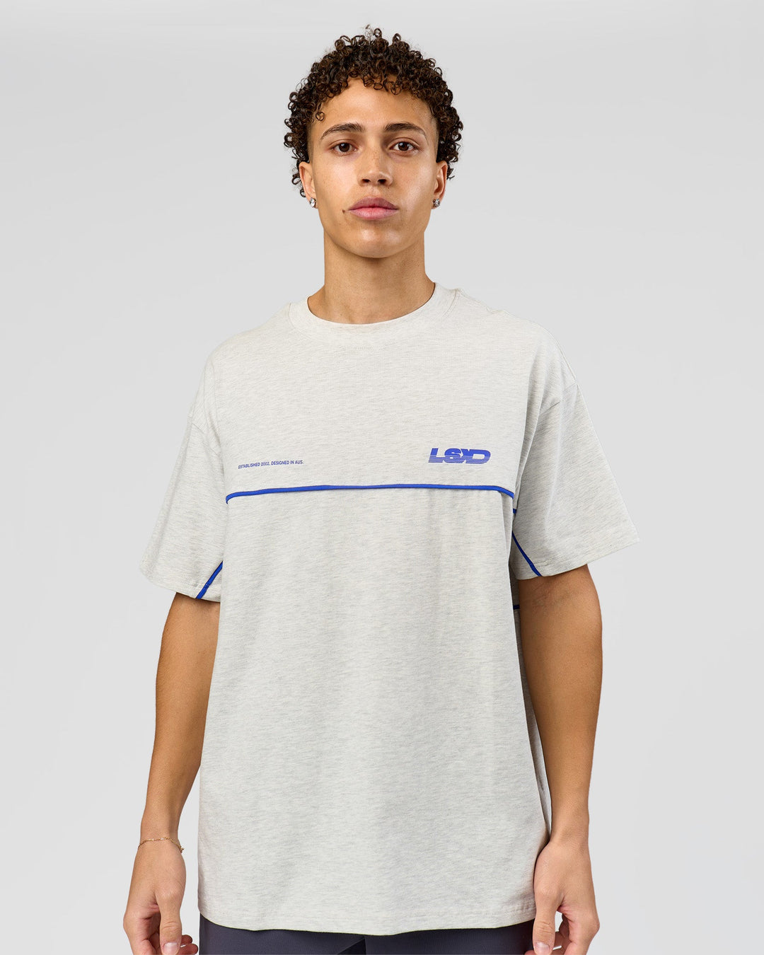 Man wearing Inline Heavyweight FLXCotton Oversized Tee - Silver Marl-Power Cobalt | Model:Leandro | Size:M - view 5