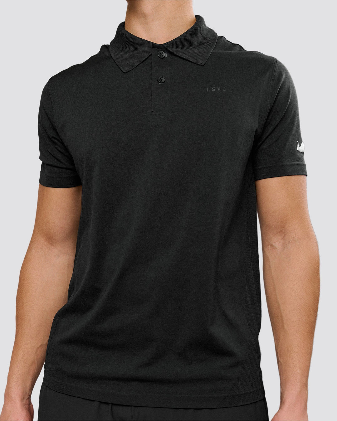Man wearing Movember x LSKD Drive Seamless Polo - Black | Model:Leandro | Size:M - view 8