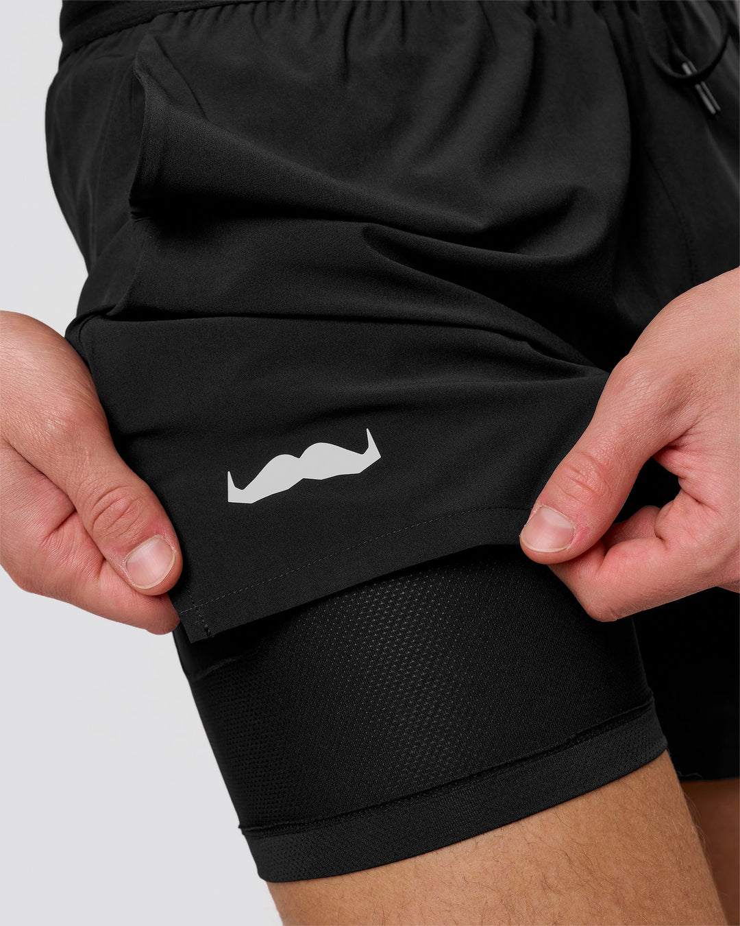 Man wearing Movember x LSKD Pace 5" Lined Running Short - Black | Model:Leandro | Size:M - view 5