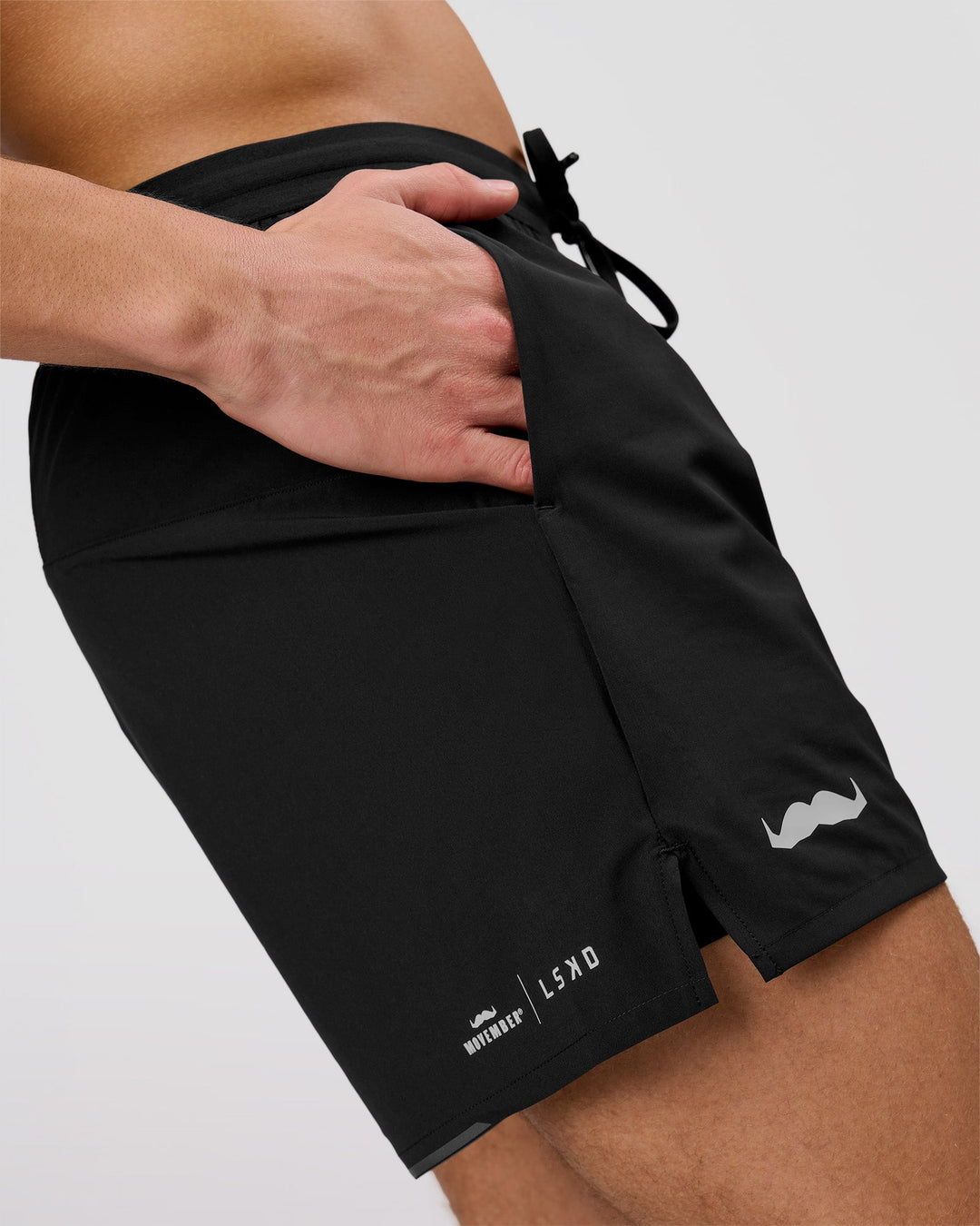 Man wearing Movember x LSKD Pace 5" Lined Running Short - Black | Model:Leandro | Size:M - view 7