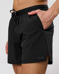 Man wearing Movember x LSKD Pace 5" Lined Running Short - Black | Model:Leandro | Size:M | Thumbnail Index: 8