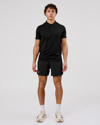Man wearing Movember x LSKD Pace 5" Lined Running Short - Black | Model:Leandro | Size:M | Thumbnail Index: 9