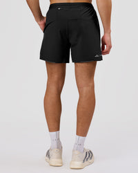 Man wearing Movember x LSKD Pace 5" Lined Running Short - Black | Model:Leandro | Size:M | Thumbnail Index: 10