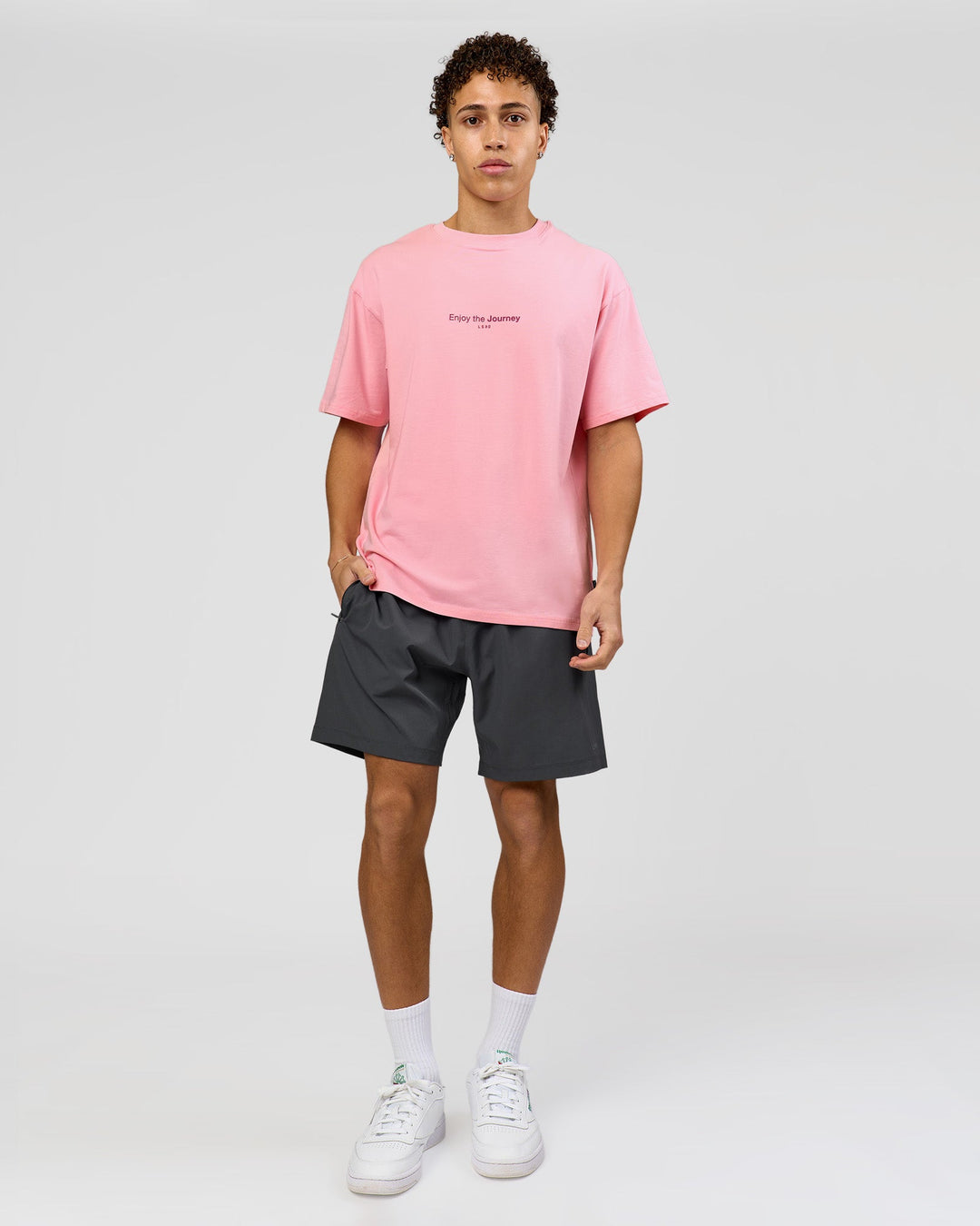 Man wearing VS1 Enjoy The Journey FLXCotton Oversize Tee - Pink Rose | Model:Leandro | Size:M - view 11
