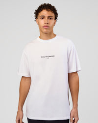 Man wearing VS1 Enjoy The Journey FLXCotton Oversize Tee - White | Model:Leandro | Size:M | Thumbnail Index: 1