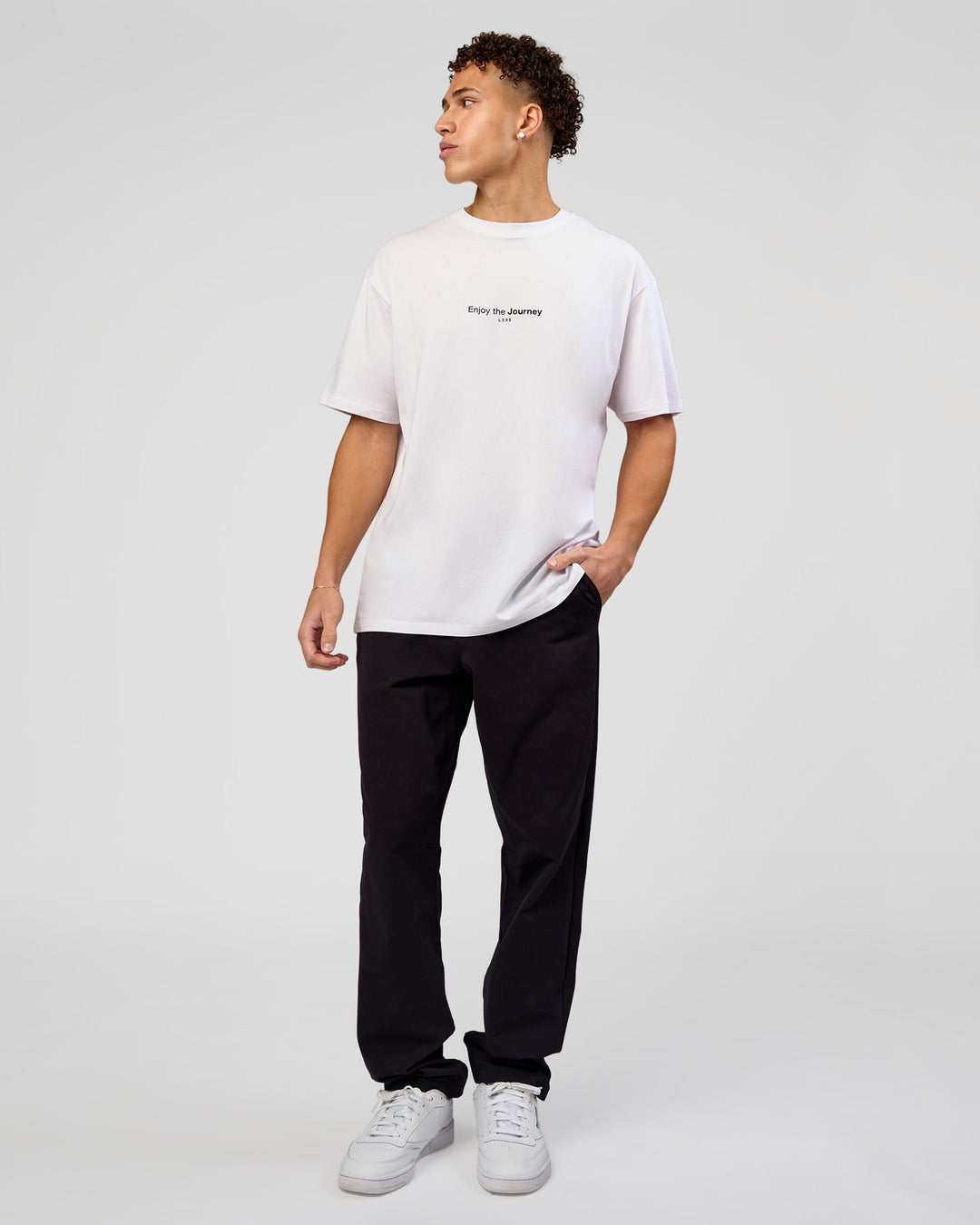 Man wearing VS1 Enjoy The Journey FLXCotton Oversize Tee - White | Model:Leandro | Size:M - view 8