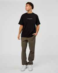 Man wearing VS6 1% Better FLXCotton Oversize Tee - Black | Model:Leandro | Size:M | Thumbnail Index: 12