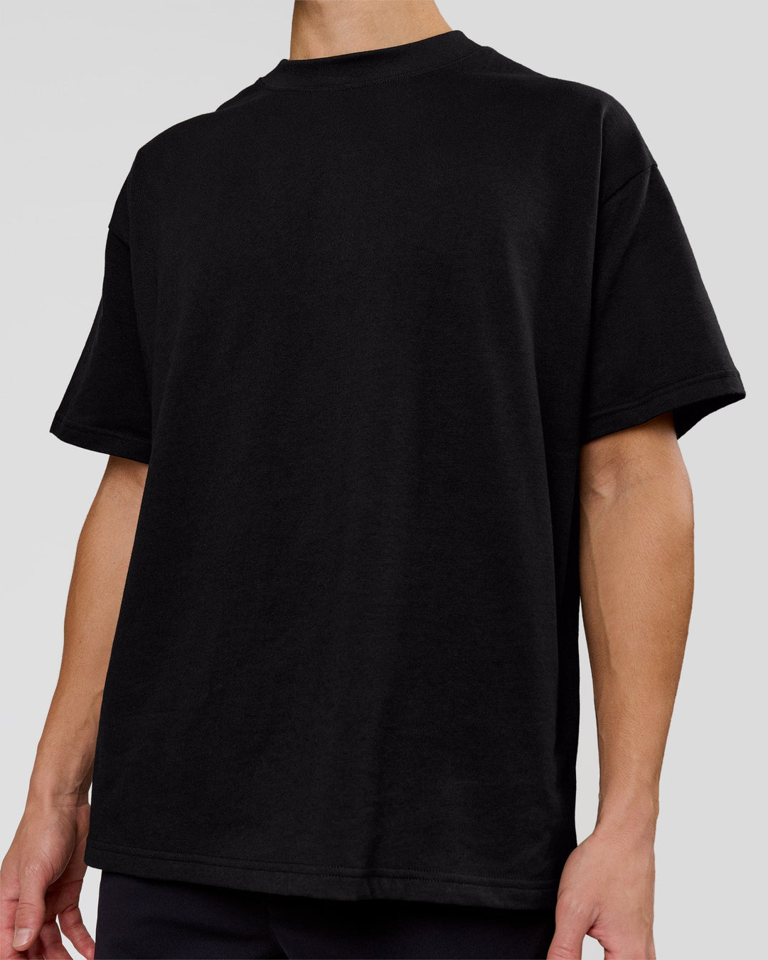 Man wearing Shadow Mark Heavyweight Oversized Tee - Black-Onyx | Model:Leandro | Size:M - view 11