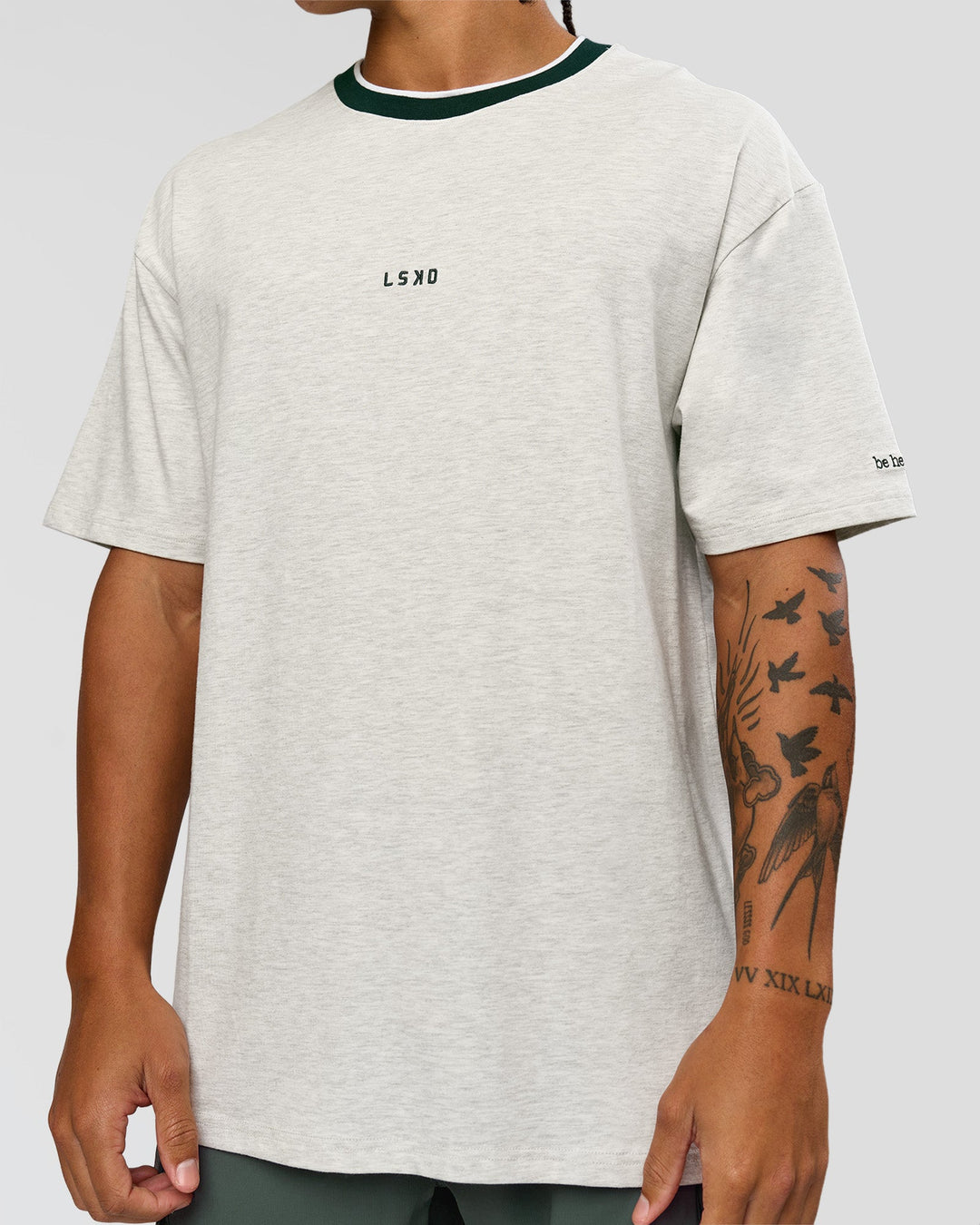 Man wearing Be Here Now Heavyweight FLXCotton Tee Oversize - Silver Marl-Midnight Green | Model:Malebo | Size:M - view 4
