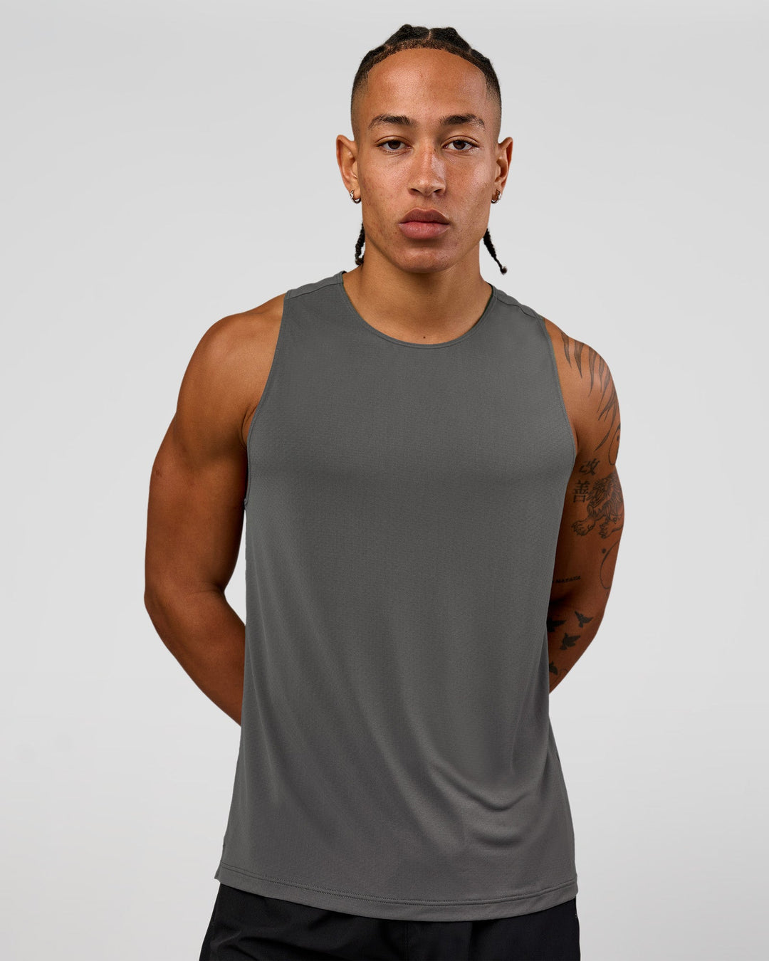 Man wearing Rep Training Tank - Dark Storm | Model:Malebo | Size:M - view 1
