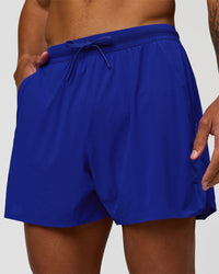 Man wearing UltraAir 5" Lined Performance Short  - Electric Indigo | Model:Malebo | Size:M | Thumbnail Index: 0