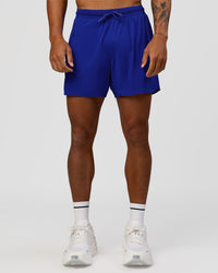 Man wearing UltraAir 5" Lined Performance Short  - Electric Indigo | Model:Malebo | Size:M | Thumbnail Index: 9