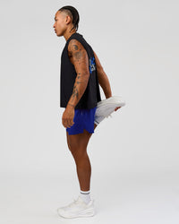 Man wearing UltraAir 5" Lined Performance Short  - Electric Indigo | Model:Malebo | Size:M | Thumbnail Index: 4
