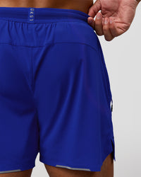 Man wearing UltraAir 5" Lined Performance Short  - Electric Indigo | Model:Malebo | Size:M | Thumbnail Index: 10