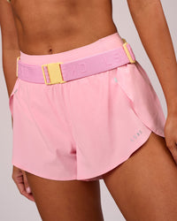 Studio image of Accelerate Run Belt - Lemon-Pink Rose | Thumbnail Index: 2