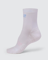 Studio image of Flow Performance Quarter Socks - White-Open Air | Thumbnail Index: 1