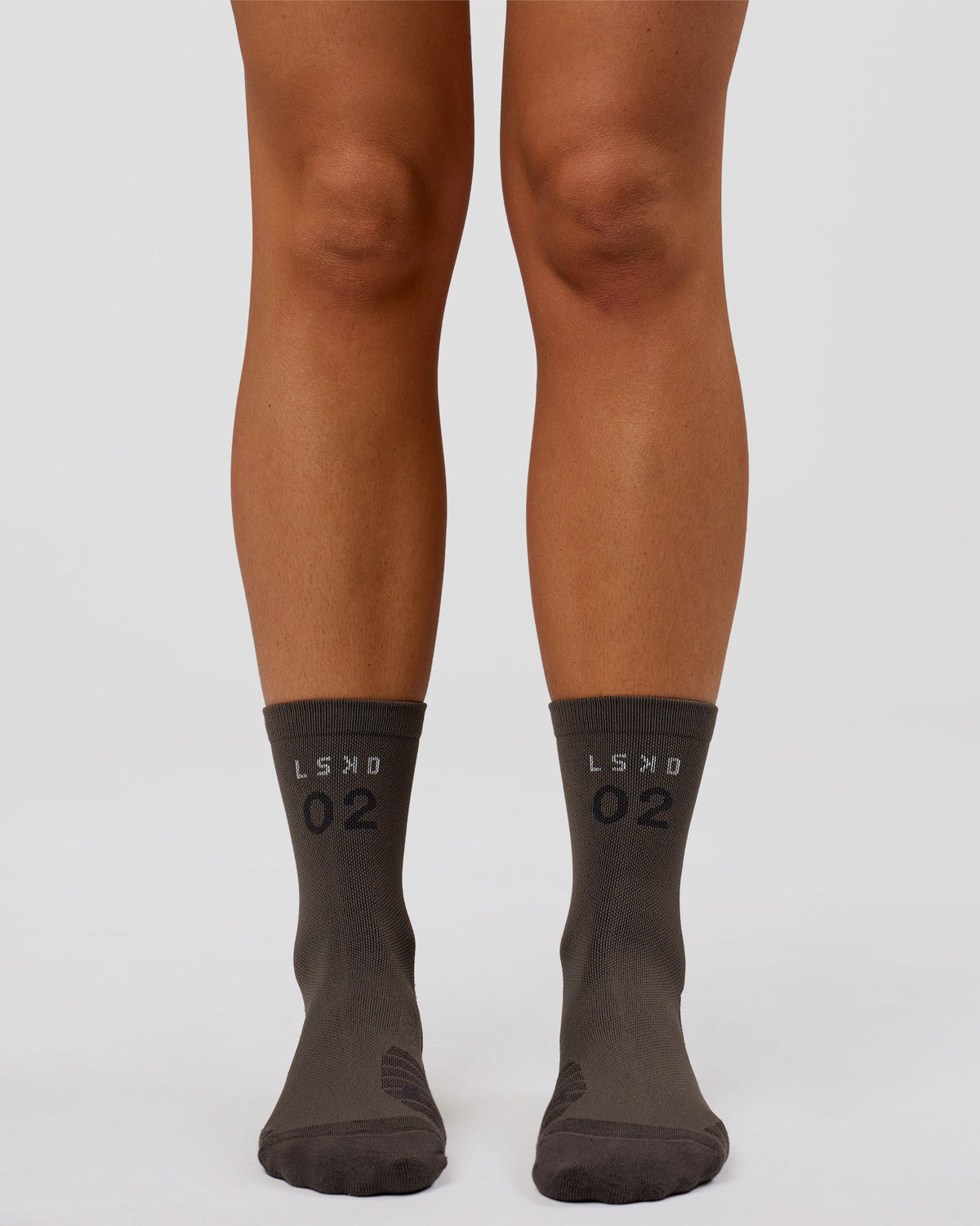 Studio image of Hype Performance Quarter Socks - Onyx-Off White