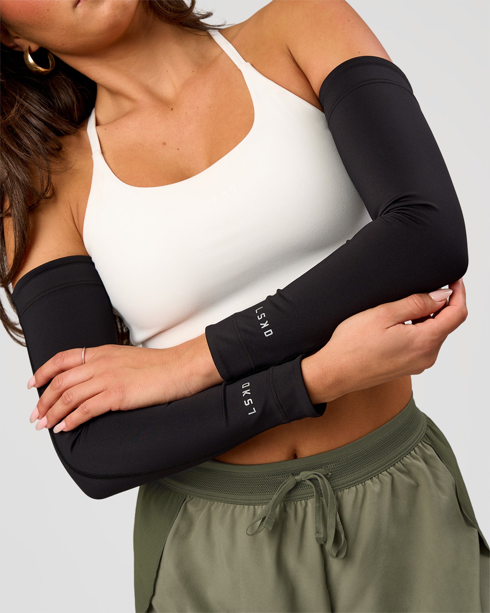Studio image of Pace Run Sleeves - Black