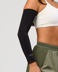 Studio image of Pace Run Sleeves - Black | Thumbnail Index: 1