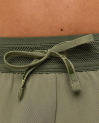Woman wearing Accelerate 3" Mid-Rise Running Short - Pure Olive-Fog | Model:Xs | Size:ISSY | Thumbnail Index: 6
