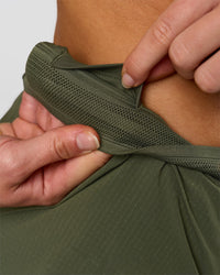 Woman wearing Accelerate 3" Mid-Rise Running Short - Pure Olive-Fog | Model:Xs | Size:ISSY | Thumbnail Index: 13