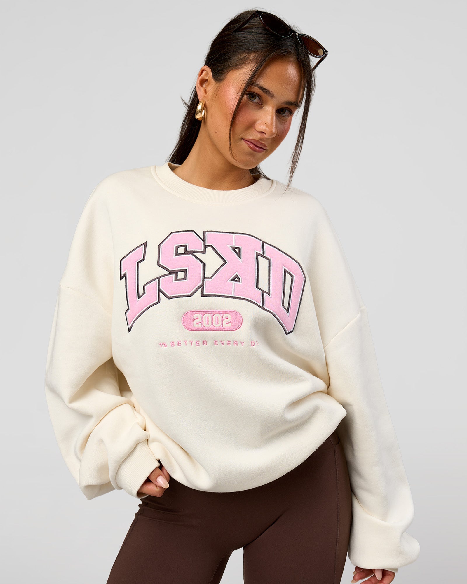 Woman wearing Varsity Boxy Crew - Off White-Pink Rose | Model:Bianca | Size:L