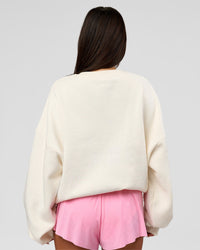 Woman wearing Varsity Boxy Crew - Off White-Pink Rose | Model:Bianca | Size:L | Thumbnail Index: 12