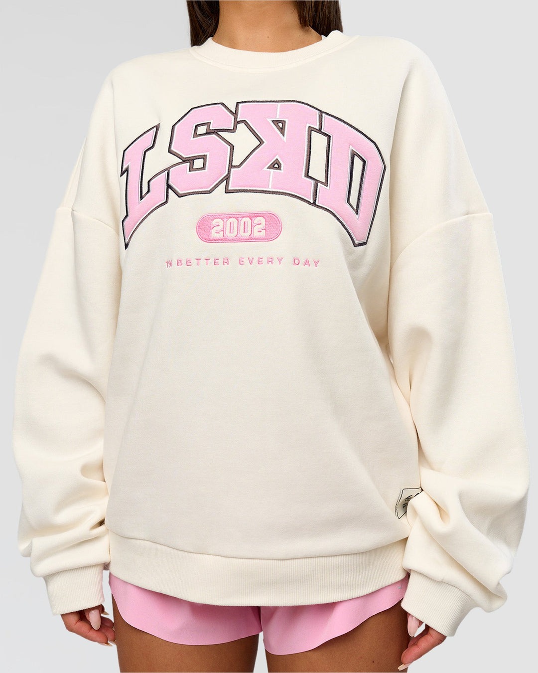 Woman wearing Varsity Boxy Crew - Off White-Pink Rose | Model:Bianca | Size:L - view 14