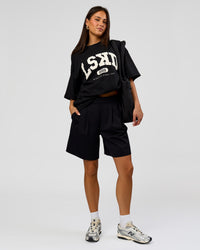 Woman wearing Varsity EST Heavyweight Oversized Tee  - Black-Off White | Model:Bianca | Size:L | Thumbnail Index: 10