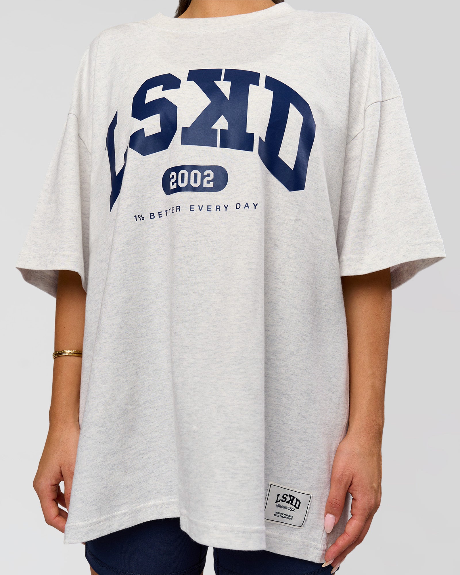 Woman wearing Varsity EST Heavyweight Oversized Tee  - Silver Marl-Future Navy | Model:Bianca | Size:L