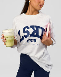 Woman wearing Varsity EST Heavyweight Oversized Tee  - Silver Marl-Future Navy | Model:Bianca | Size:L | Thumbnail Index: 5